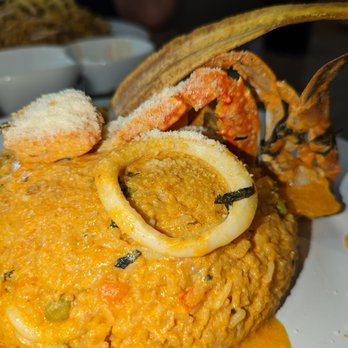 Tullpa Restaurant - Arroz con Mariscos - Peruvian Near Me - Des Moines, Iowa Tullpa Restaurant - Arroz con Mariscos - Peruvian Near Me - Des Moines, Iowa