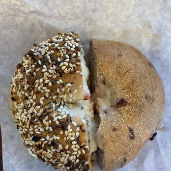 New York Bagel - Half of an everything bagel with vegetable cream cheese, and half of a blueberry bagel with honey and walnut cream cheese. - Bagels Near Me - Rohnert Park, California New York Bagel - Half of an everything bagel with vegetable cream cheese, and half of a blueberry bagel with honey and walnut cream cheese. - Bagels Near Me - Rohnert Park, California