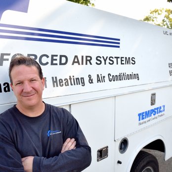 Forced Air Systems - Andrew Dolling, the owner, standing next to one of his trucks. - Heating & Air Conditioning/HVAC Near Me - Redwood City, California Forced Air Systems - Andrew Dolling, the owner, standing next to one of his trucks. - Heating & Air Conditioning/HVAC Near Me - Redwood City, California