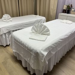 Sunrise Massage - Couple massage bed