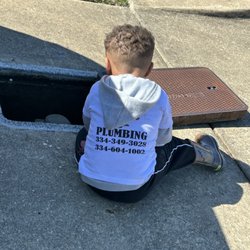 Stewart Plumbing - Ky ky working on a water meter