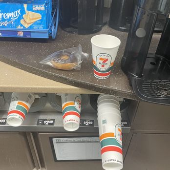 7-Eleven - a coffee maker and cups on a counter - Convenience Stores Near Me - Burbank, California 7-Eleven - a coffee maker and cups on a counter - Convenience Stores Near Me - Burbank, California