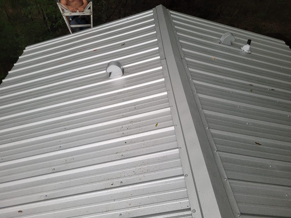 Slide of Moore Elite Roofing