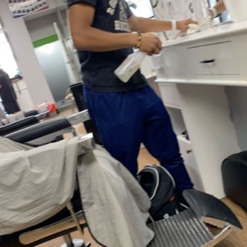 Elegance Barber & Salon - This is a picture I managed to sneak of John, after cutting my sons hair! - Barbers Near Me - Toronto, Ontario Elegance Barber & Salon - This is a picture I managed to sneak of John, after cutting my sons hair! - Barbers Near Me - Toronto, Ontario