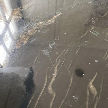 Payless Kitchen Cabinets - Backsplash guy decided it's a good idea to cut materials directly on the granite - General Contractors Near Me - Glendale, California