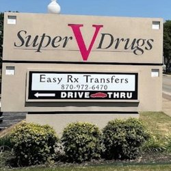 Super V Drug Store - View of sign located alongside the street