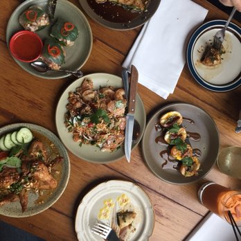 Paadee - Some of our dishes. Som-o, fried soft boiled egg, chicken wings, and rice paper wrapped party-in-your-mouth bites - Thai Near Me - Portland, Oregon
