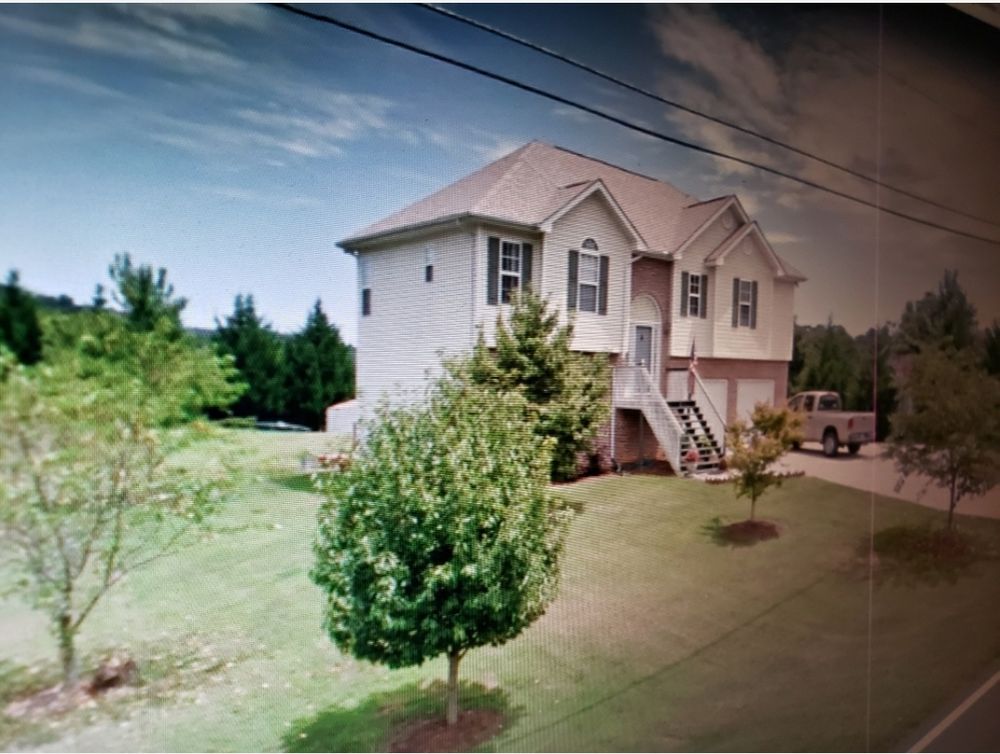Slide of Herbert Shiflett Roofing