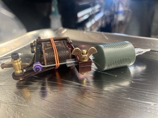 Iron and Gold Tattoo by null