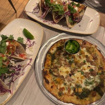 Monkeypod Kitchen by Merriman - Fish tacos and kalua pork and pineapple pizza; pizza went CRAZY - New American Near Me - Kihei, Hawaii