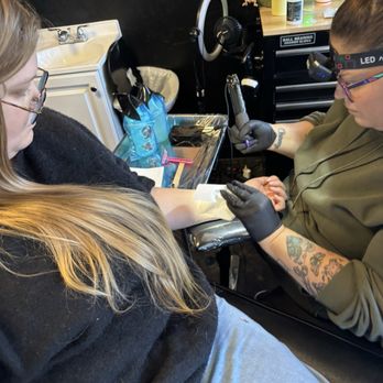 Silver Squid Ink - My niece being tattooed - Tattoo Near Me - Las Vegas, Nevada