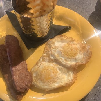 The Friendly Toast - Vegan Sausage, waffle fries and two eggs over easy - Breakfast & Brunch Near Me - Danvers, Massachusetts The Friendly Toast - Vegan Sausage, waffle fries and two eggs over easy - Breakfast & Brunch Near Me - Danvers, Massachusetts