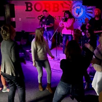 Bobby V's Cocktails - a group of people dancing - Cocktail Bars Near Me - Anaheim, California Bobby V's Cocktails - a group of people dancing - Cocktail Bars Near Me - Anaheim, California