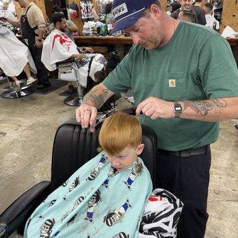 Hermanos Barber Shop - Nate Peak cutting my son's hair. - Barbers Near Me - Cypress, California Hermanos Barber Shop - Nate Peak cutting my son's hair. - Barbers Near Me - Cypress, California