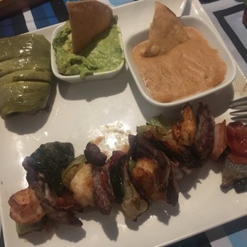 Los Arcos - Brocheta mixta: steak & shrimp with veggies, a side of beans and guacamole. - Seafood Near Me - Tijuana, BCN Los Arcos - Brocheta mixta: steak & shrimp with veggies, a side of beans and guacamole. - Seafood Near Me - Tijuana, BCN
