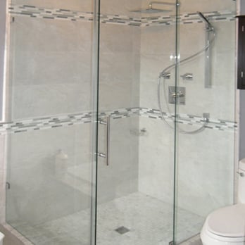 Doors And More - a bathroom with a toilet and shower - General Contractors Near Me - Vaughan, Ontario Doors And More - a bathroom with a toilet and shower - General Contractors Near Me - Vaughan, Ontario