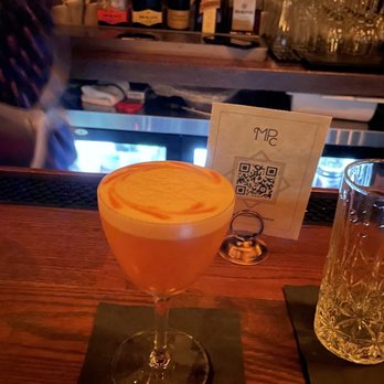 Molly Pitcher Club - Curry Row: Curry Spiced Rum Blend, Chai, Carrot, Lemon, Eggwhite - Cocktail Bars Near Me - New York, New York Molly Pitcher Club - Curry Row: Curry Spiced Rum Blend, Chai, Carrot, Lemon, Eggwhite - Cocktail Bars Near Me - New York, New York