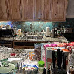 Bunk House Lodge - The remnants of the complimentary breakfast and gorgeous copper backsplash.