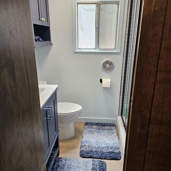 Retriever Remodeling - Added a fan under the window and all wiring is up to code now. Removed the paneling, added new installation and green board all around. - Handyman Near Me