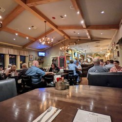 Palm Valley Fish Camp - Inside. Dining room. View from corner booth facing dining room, bar, and restaurant entrance.