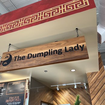 The Dumpling Lady - The Dumpling Lady sign inside Optimist Hall - Szechuan Near Me - Charlotte, North Carolina The Dumpling Lady - The Dumpling Lady sign inside Optimist Hall - Szechuan Near Me - Charlotte, North Carolina
