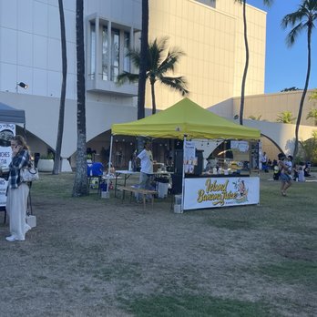 Island Banana Juice - a group of people standing under a tent - Juice Bars & Smoothies Near Me - Honolulu, Hawaii Island Banana Juice - a group of people standing under a tent - Juice Bars & Smoothies Near Me - Honolulu, Hawaii