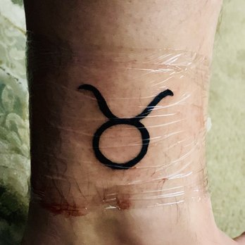 Riot Ink - My first tattoo placed on my ankle, taken later. I was told it was hard to make a perfect circle even with a stencil. Just not pleased today - Tattoo Near Me - Powell, Ohio