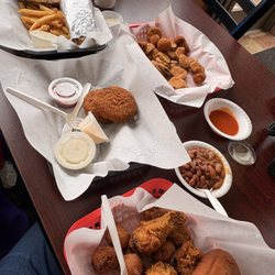 Sam’s Southern Eatery - Buffalo wings with a Roll and pinto beans. Crab Cakes. Philly Cheesesteak Sandwich with fries. Fried Mushrooms & Fried Pickles
