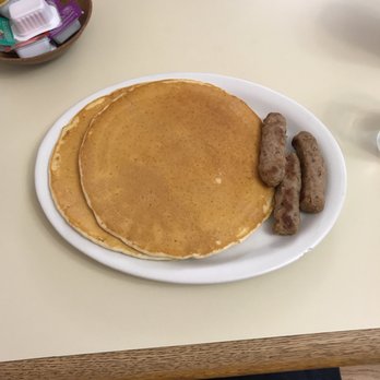 Red Apple Cafe - pancakes and sausages on a white plate - Cafes Near Me - Mahnomen, Minnesota