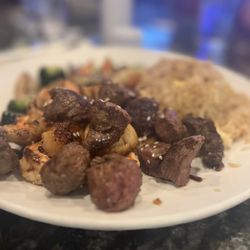 Otaki Japanese Steakhouse - Couples special - steak, lobster, shrimp, fried rice, veggies, soup & salad. Awesome