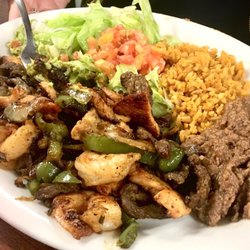 El Jardin Restaurant - Mixed fajitas lunch special.  With rice and refried beans.
