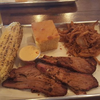 Badlands BBQ - Brisket, corn on the cob, corn bread, and onion straws with a chipotle sauce. All very good! - Barbeque Near Me - Norco, California Badlands BBQ - Brisket, corn on the cob, corn bread, and onion straws with a chipotle sauce. All very good! - Barbeque Near Me - Norco, California