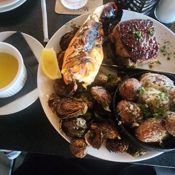 Elbow Room - 7 oz new york steak , with roasted potatoes,  Brussel sprouts,  and added half lobster - New American Near Me - Fresno, California