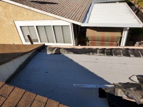 Slide of Dominic's Roofing