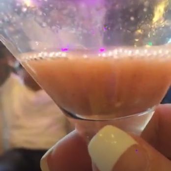 Rica Elixir - a hand holding a glass filled with liquid - Herbs & Spices Near Me - Santa Cruz, California