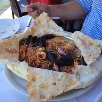 Pizzeria Tre Archi - Seafood spaghetti - loved the bread that came over the top of it! - Bars Near Me - Venezia, VE