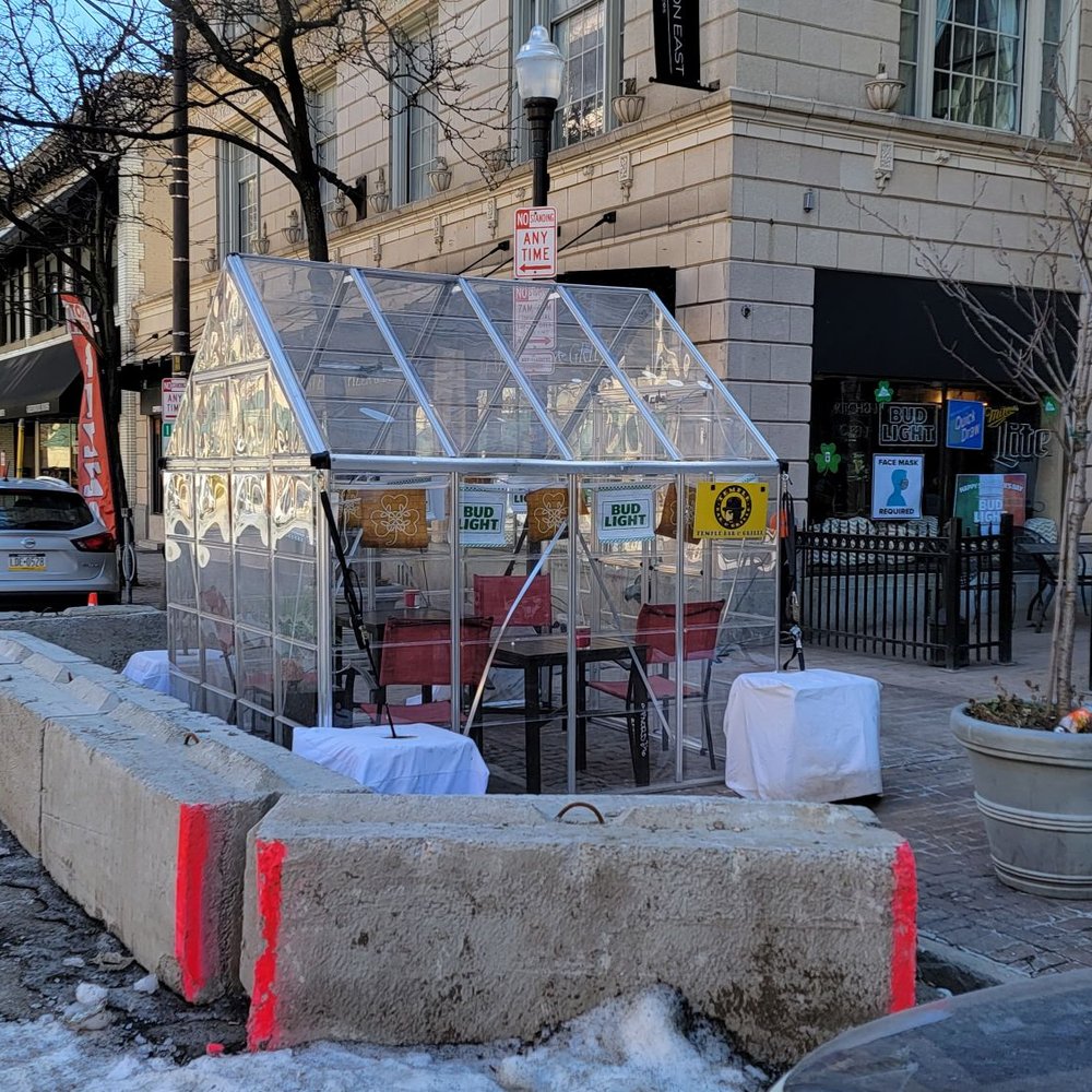 Cozy looking drinking area set up outside of temple bar and grille