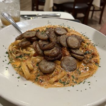 Mama Lucia's Restaurant - Fettuccine Bolognese with Side of Sausage - One - Italian Near Me - Newnan, Georgia Mama Lucia's Restaurant - Fettuccine Bolognese with Side of Sausage - One - Italian Near Me - Newnan, Georgia