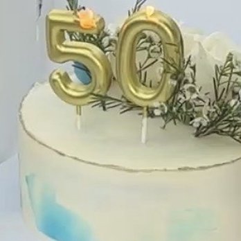 La Bouchée - A simple design with flowers and a few decorative balls- strawberry cream - Custom Cakes Near Me La Bouchée - A simple design with flowers and a few decorative balls- strawberry cream - Custom Cakes Near Me