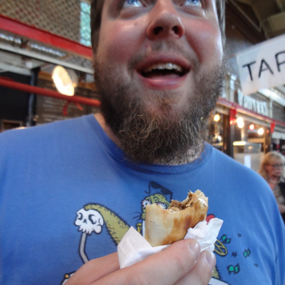 Markthalle Neun - Ian enjoys a spicy empanada at Street Food Thursday - Public Markets Near Me - Berlin, BE Markthalle Neun - Ian enjoys a spicy empanada at Street Food Thursday - Public Markets Near Me - Berlin, BE
