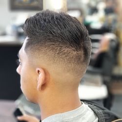 Mid fade with texture top done by hector