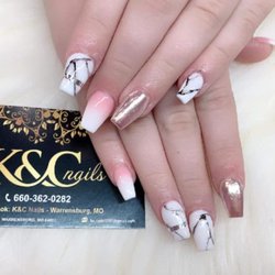 K&C nails - A great combination among marble, ombre, and holograph make your nails become more special! It is always fun to try something new!