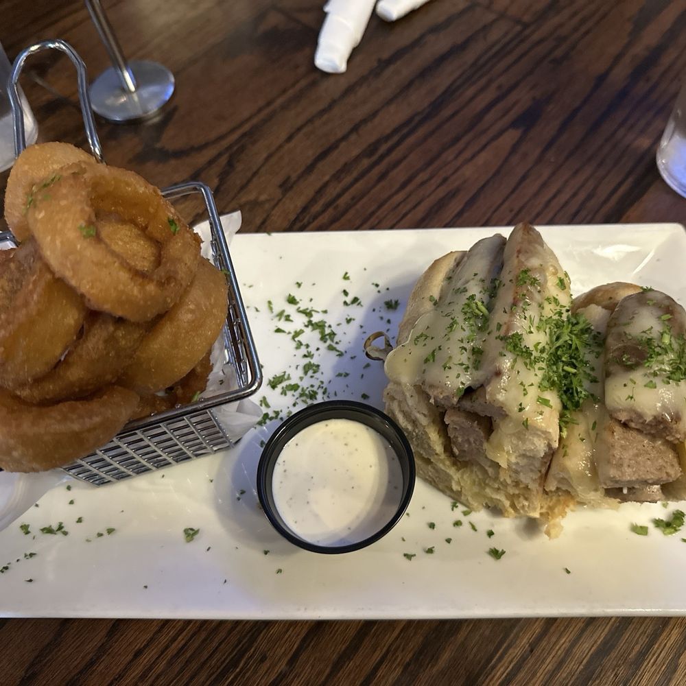 Solvang Brewing Company - beer brat sausage torpedo w/ onion rings - Breweries Near Me - Solvang, California Solvang Brewing Company - beer brat sausage torpedo w/ onion rings - Breweries Near Me - Solvang, California