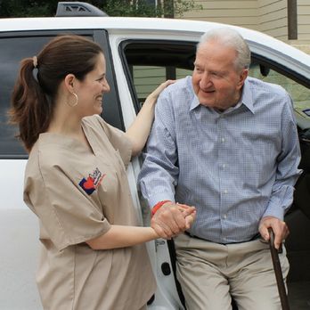 Caring Senior Service - Caregiver assisting Senior out of the vehicle. - Home Health Care Near Me - San Antonio, Texas Caring Senior Service - Caregiver assisting Senior out of the vehicle. - Home Health Care Near Me - San Antonio, Texas
