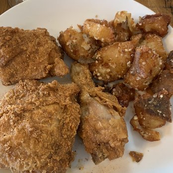 Tupelo Honey Southern Kitchen & Bar - Honey dust fried chicken with Potato Cracklins w/ Parmesan & Rosemary - New American Near Me - Frisco, Texas Tupelo Honey Southern Kitchen & Bar - Honey dust fried chicken with Potato Cracklins w/ Parmesan & Rosemary - New American Near Me - Frisco, Texas