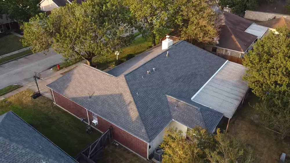 Slide of Spartan Roofing