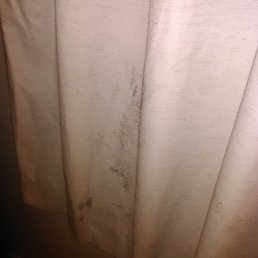 These r the curtains hanging in the room..full of holes, filthy..gross These r the curtains hanging in the room..full of holes, filthy..gross