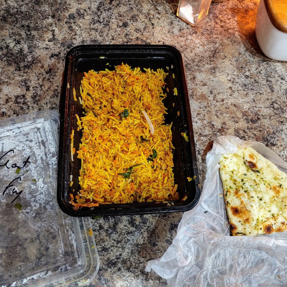 Biryani Pot, Indian Restaurant - What's left of my goat fry biryani and garlic basil naan. I didn't remember to take a pic BEFORE digging in. Whoops! Delicious though! - Indian Near Me - Chandler, Arizona Biryani Pot, Indian Restaurant - What's left of my goat fry biryani and garlic basil naan. I didn't remember to take a pic BEFORE digging in. Whoops! Delicious though! - Indian Near Me - Chandler, Arizona