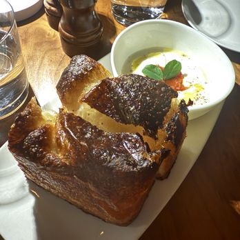 Nick & Toni's - Warm Rosemary, Thyme, Sea Salt Focaccia - Italian Near Me - East Hampton, New York Nick & Toni's - Warm Rosemary, Thyme, Sea Salt Focaccia - Italian Near Me - East Hampton, New York