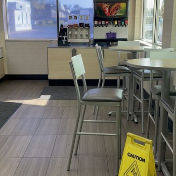Subway - a wet floor sign on the floor - Sandwiches Near Me - St Louis, Missouri
